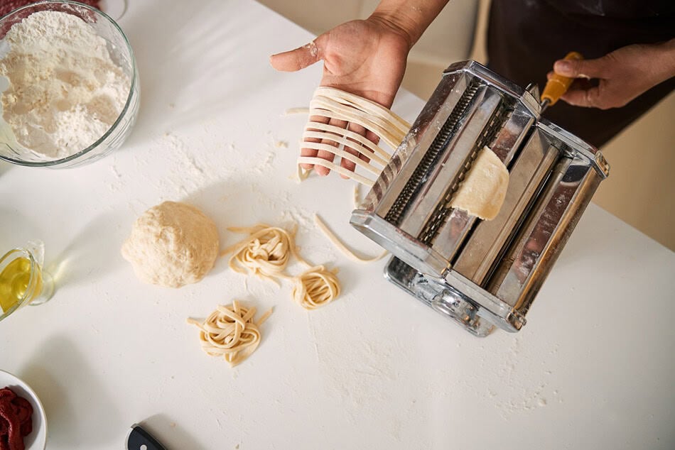 fresh pasta cutting in the modern machine 2024 10 18 10 06 52 utc