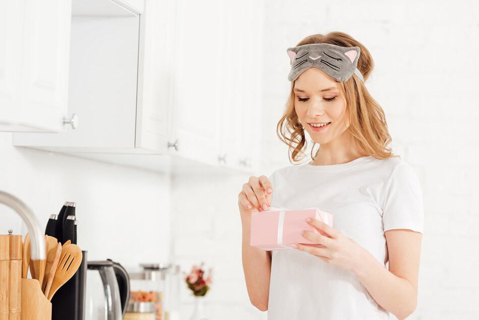 beautiful girl in pajamas and sleeping mask openin 2024 11 19 13 44 37 utc