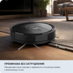 Робот-прахосмукачка X-Clean 3in1 с Wi-Fi в елегантен черен цвят лесно преминава от твърда повърхност към килим, демонстрирайки способността си да преодолява неравности до 1,5 см — точно както машина за сладолед с компресор плавно се адаптира към различните текстури при приготвянето на замразени десерти. Текстът на български език подчертава нейната ефективност при почистване на килими и преминаване през прагове.